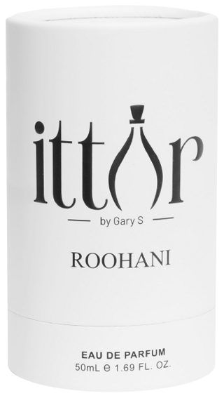 Roohani gift box, a white cylindrical case printed with the ittar logo in black